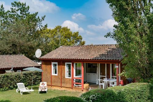 Camping Sandaya Les Peneyrals - Chalet Castelnaud 2 bedrooms *** - Photo 1