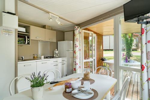 Camping Sandaya Les Peneyrals - Chalet Castelnaud 2 bedrooms *** - Photo 4