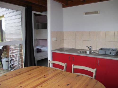Camping Les Bruyères - Our chalets - Photo 8