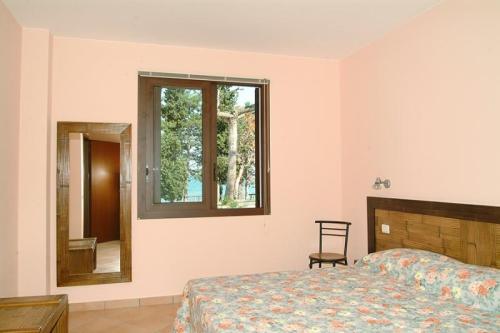Camping Zocco-Garda Lake - Bungalow Orizzonte 3-rooms - Photo 4