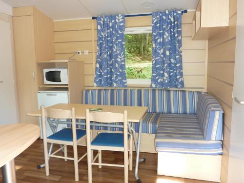 CAMPING LES CRUSES - Mobil-Home Grand Comfort - Photo 7