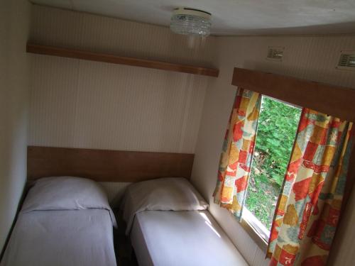 CAMPING LA BASTIDE - MOBILE HOME BAMBI 15 m² (2 bedrooms - without toilet blocks) - Photo 6
