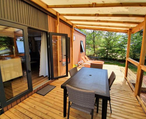Sites et Paysages Domaine de l'Etang de Bazange - Cottage Premium "Dedans Dehors" cuisine ouverte sur la terrasse, TV, clim - Photo 1