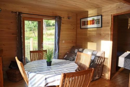 Sites et Paysages Domaine de l'Etang de Bazange - AQUALODGE NATURE©, floating house 30 m² with the breathtaking view of the lake,TV - Photo 7
