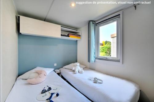 Flower Camping Les Ilates - Homeflower PREMIUM 26,5m² (2 bedrooms) + CLIM + half-covered terrace + TV + sheets + towels - Photo 6