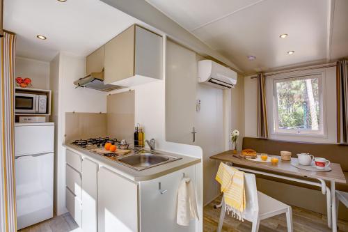 Camping Sandaya Cypsela Resort - Cottage 2 bedrooms airconditioning** - Photo 2