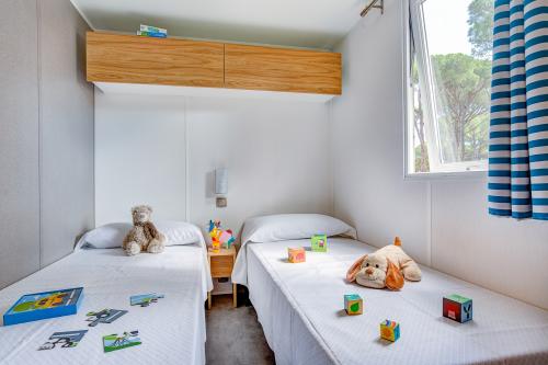 Camping Sandaya Cypsela Resort - Cottage 2 bedrooms air-conditioning**** - Photo 4