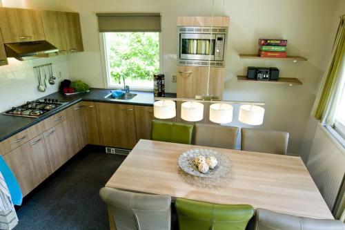 RCN Vakantiepark de Noordster - Bungalow Saturnus - Photo 2
