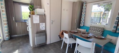 Camping de Saulieu - Mobile home Super Mercure Riviera - Photo 3