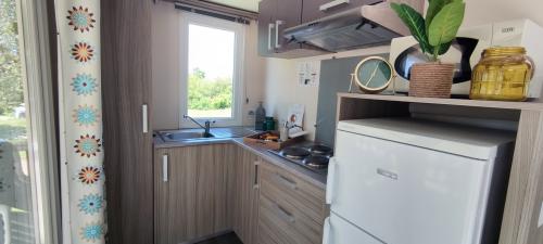 Camping de Saulieu - Mobile home Super Mercure Riviera - Photo 4