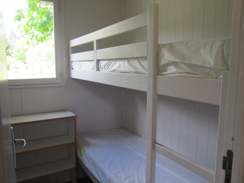 Flower Camping La Rochelambert - Cabanon ECO Jaune 12m² 1 bedroom + Terrace 3m² - without toilet block - Photo 9