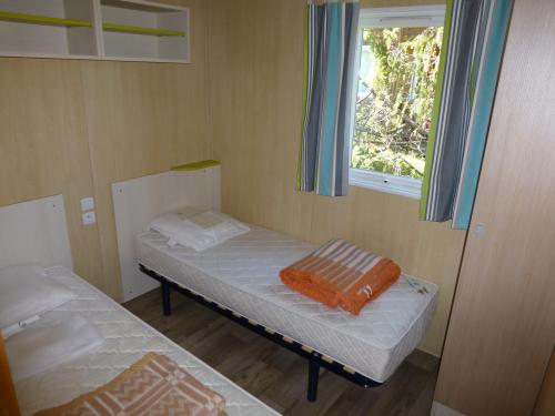 Camping Bleu Soleil - Chalet Charmille with TV and heating - 2 bedrooms - Photo 7