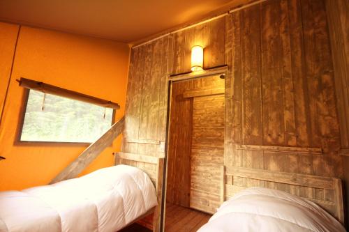 Les Castels Le Brévedent - Canvas Cottage Woody Confort - Photo 9