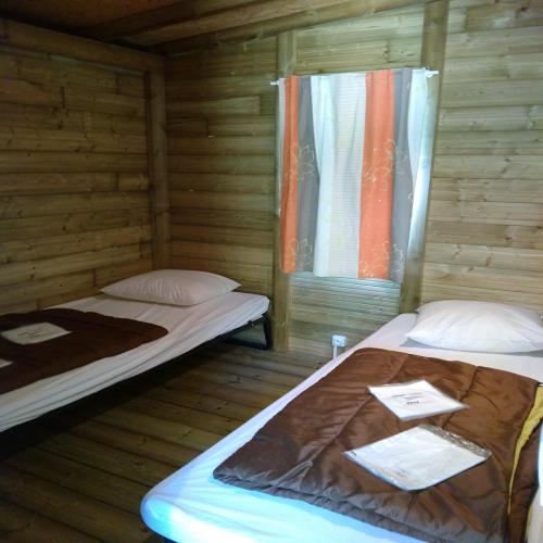 Flower Camping du Port Caroline - Wooden cabin Family 25m² - 3 bedrooms (without toilet blocks) - Photo 4