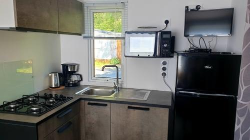 Camping Bois de Gravière - Chalet Mobile Panama 23 m² (2 bedrooms + terrace) - Photo 6