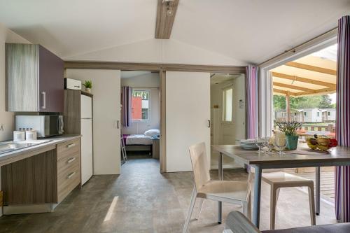 Camping Sandaya Paris Maisons Laffitte - Cottage 2 bedrooms ** adapted to the people with reduced mobility - Photo 4