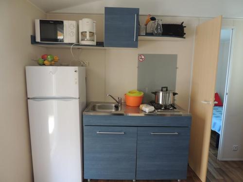 Flower Camping Domaine de Gajan - Mobil-home Confort HOLIDAY 25m² (2 Bedrooms) - Covered terrace 15m² + TV - Photo 7