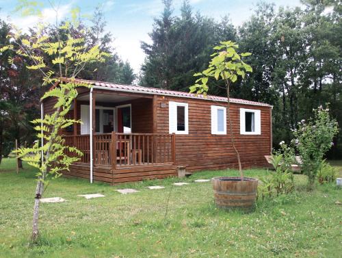 Camping FONTAINE DU ROC - Bungalow - Photo 8