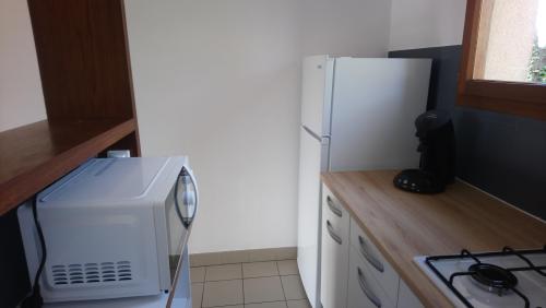 Camping FONTAINE DU ROC - Premium Cottage (1/4 p) - Photo 9