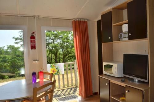 Camping Les Terrasses du Lac - Cottage 3 bedrooms airconditionned 28m² - Photo 5