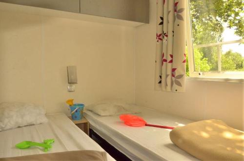 Camping Les Terrasses du Lac - Cocoon air-conditionned (2 bedrooms) 26m² - Photo 7
