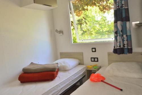 Camping Les Terrasses du Lac - Cocoon air-conditionned (2 bedrooms) 26m² - Photo 8