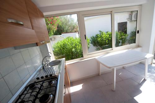 Camping Capo Vieste - Cottage - Photo 4