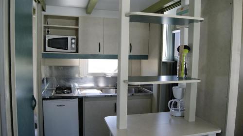 Camping Le Roc del Rey - Chalet 2 bedrooms - Photo 1