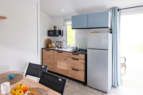Camping Les Prés de la Mer - Mobil home Cosy 2 chambres - Photo 3