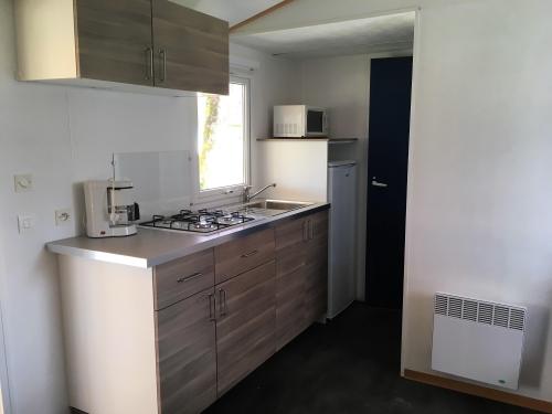 Camping Les Pommiers d'Aiguelèze - Mobile home IRM 2 bedrooms - 28 m² - Photo 3