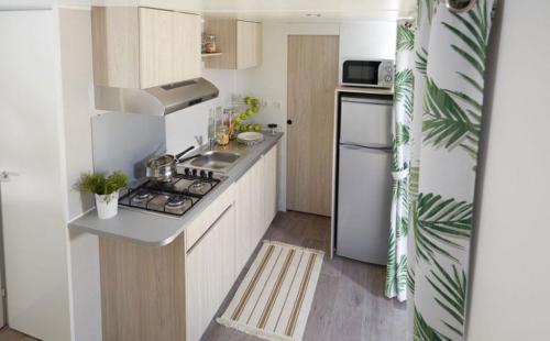 Camping du PIGEONNIER - Mobile-home 2 bedrooms PADIRAC LUXE 30 m2 + Half-covered terrace - Photo 4